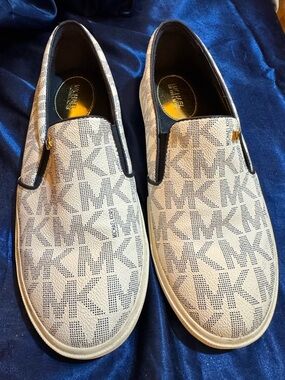 Michael Kors women’s White/Blue Logo Slip-On Sneakers